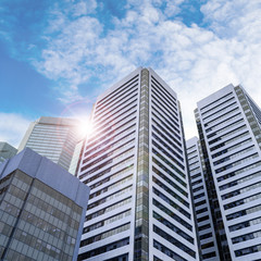 Plakat Modern Corporate Skyscrapers in Business District With Lens Flare