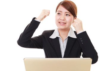 ガッツポーズのビジネスウーマン