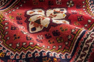 Close up of the central part of a persian shiraz oriental carpet