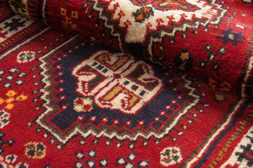 Close up of the central part of a persian shiraz runner oriental