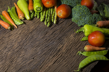 green vegetables on wood background