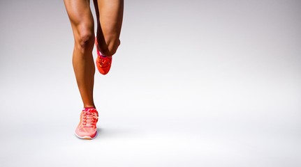 Composite image of close up of sportswoman legs