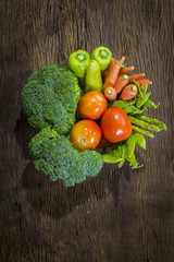 green vegetables on wood background