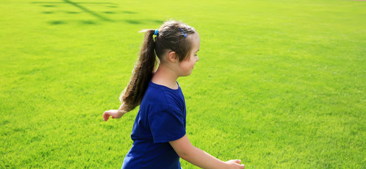 Little girl have fun on the stadium