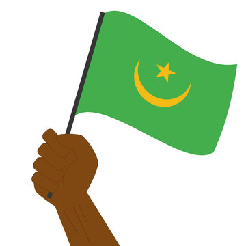recommend clip art: Hand holding and raising the national flag of Mauritania