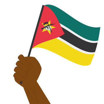 recommend clip art: Hand holding and raising the national flag of Mozambique