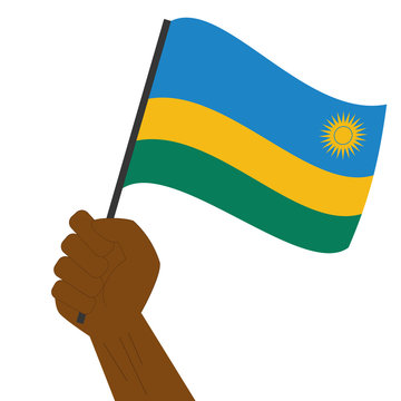 recommend clip art: Hand holding and raising the national flag of Rwanda