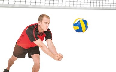 Sportsman posing while playing volleyball