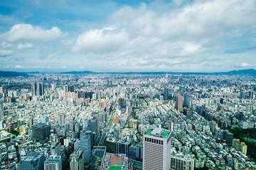 Fototapeta na wymiar Business concept for real estate and corporate construction : panoramic modern city bird eye view with and morning cloudy blue sky from 101 building in Taipei, Taiwan