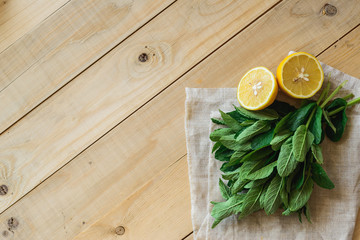 ingredients for homemade lemonade in wooden interior