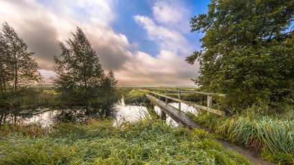 Inviting Footbridge  crossing river