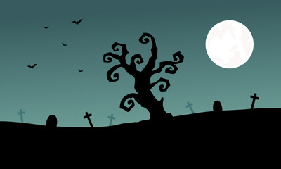 Halloween tomb and dry tree silhouette
