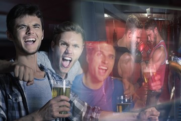 Composite image of friends are watching boxing match 