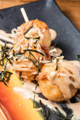 Tako yaki, a japanese snack served with mayonaise