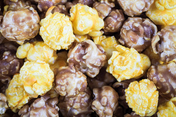 Mixed caramel and cheese popcorn, close up