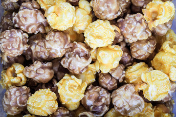 Mixed caramel and cheese popcorn, close up