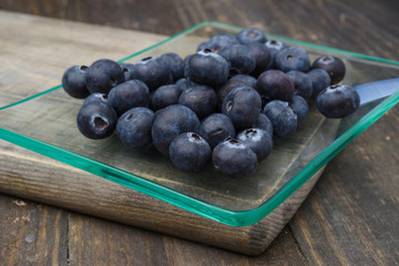 Ripe blueberries, on wood
