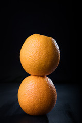 Stack of two juicy oranges