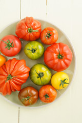 Assortment of fresh French heirloom tomatoes on a plate