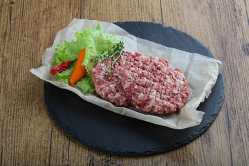 Raw burger cutlet