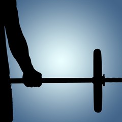 Fototapeta premium Composite image of bodybuilder lifting heavy barbell weights