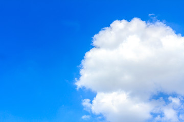 Blue sky background with white clouds. The vast blue sky and clouds sky on sunny day. White fluffy clouds in the blue sky. beautiful clouds and blue sky.
