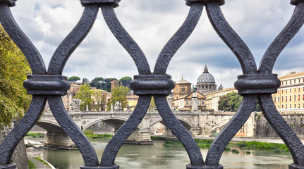 Grid on Sant Angelo bridge with view on San Pietro