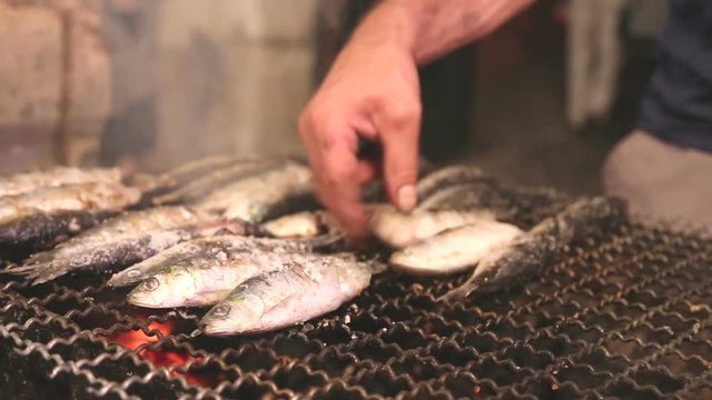 Flipping fish on grill