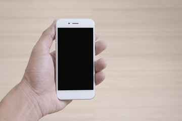 Hand holding a smartphone