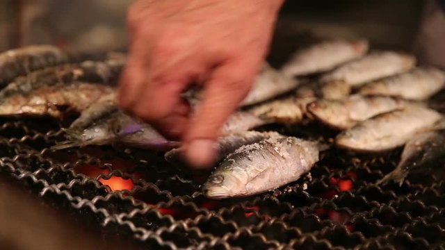 Fresh fish on the grill with smoke