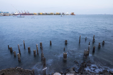 Old pier in the sea