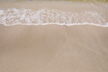 Sand beach and soft wave