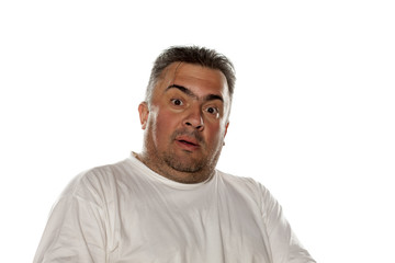 Obraz premium obese amazed man on a white background