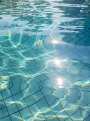 blue swimming pool rippled water background