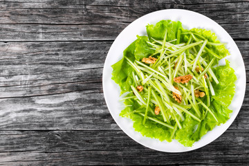 Waldorf Salad with green apples, celery and walnuts, top view