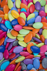 Fototapeta na wymiar Close up of a pile of colorful chocolate coated candy