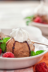 chocolate ice cream with raspberry and cream 