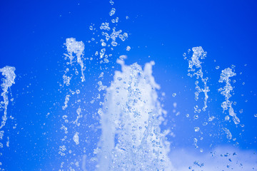 Obraz na płótnie Canvas Water fountain water jet over blue sky