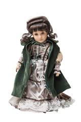 Vintage old smart porcelain doll toy in beautiful textile dress
