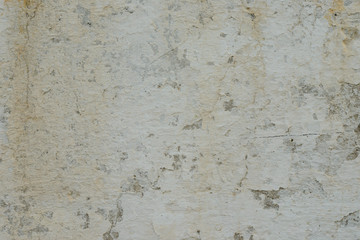 Wall fragment with scratches and cracks