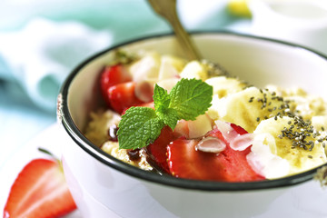 Oats porridge with banana,strawberry,chia seeds and chocolate sa