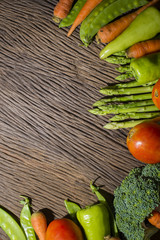 green vegetables on wood background
