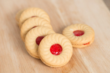 Butter cookies with strawberry jam.