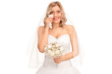 Young blond bride crying out of joy