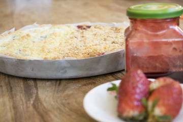 sbriciolata with cherry jam and strawberries