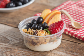 Granola with fresh fruits and yogurt, Healthy food. Selective fo
