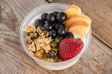 Granola with fresh fruits and yogurt.