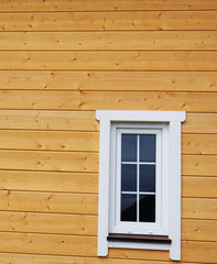 window on the wooden wall