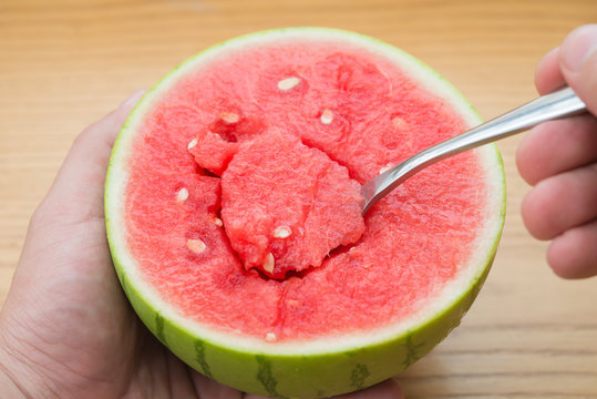eating watermelon by spoon