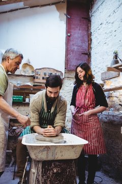 Potter with colleagues working